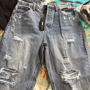 Distressed Blue Jeans